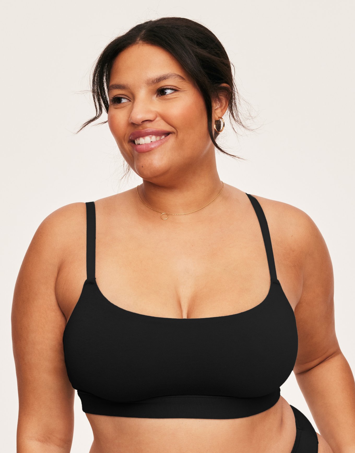ELITE COLLECTION** Black Sports Bra styled with a V-Shaped Mesh
