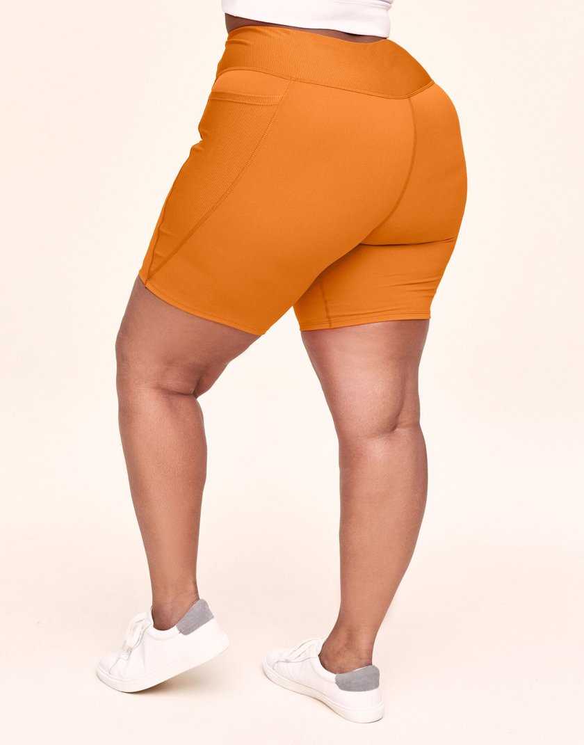 orange biker shorts